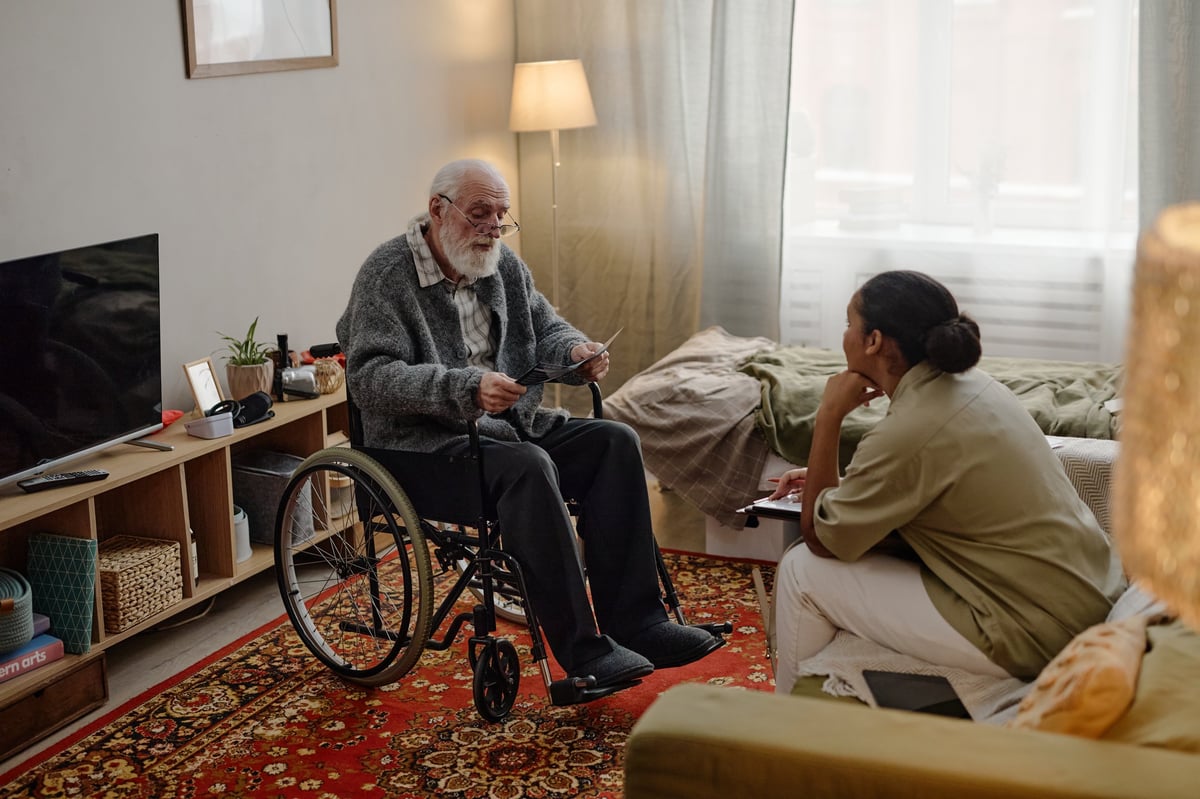 NDIS Plan Manager - Senior man with disability and social worker